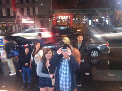 Happy group of friends outside the HDD late-night location