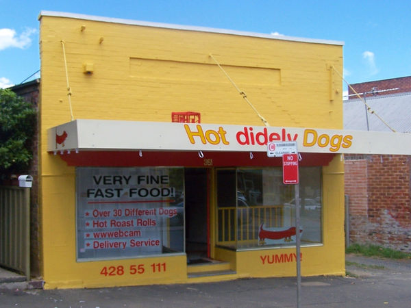 The original Hot Didely Dogs store in the Illawarra with bright yellow signage